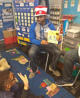 Bro. L. Wright reading to kids at a local school